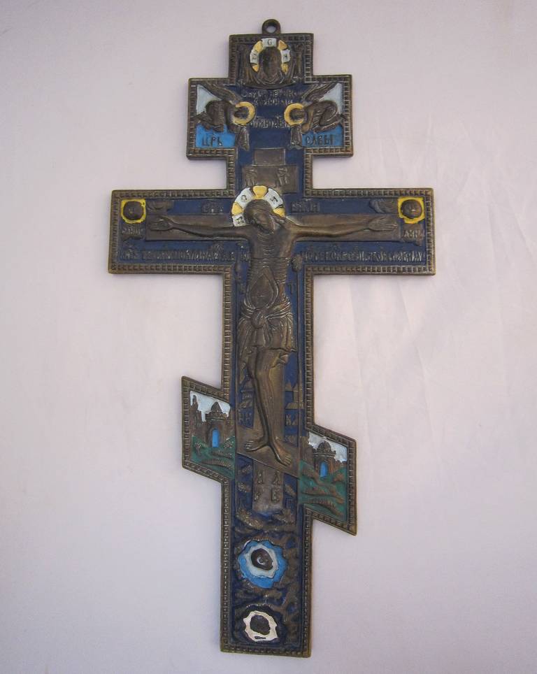 A Russian orthodox icon of enameled bronze, modeled as a hanging crucifix for traveling pilgrims and priests to set up for prayers and reflection.