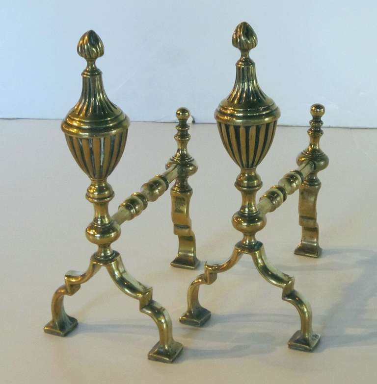 A handsome pair of English brass andirons or fire dogs.

A charming addition to the fireplace or hearth.

Sold as a pair: $695 the pair