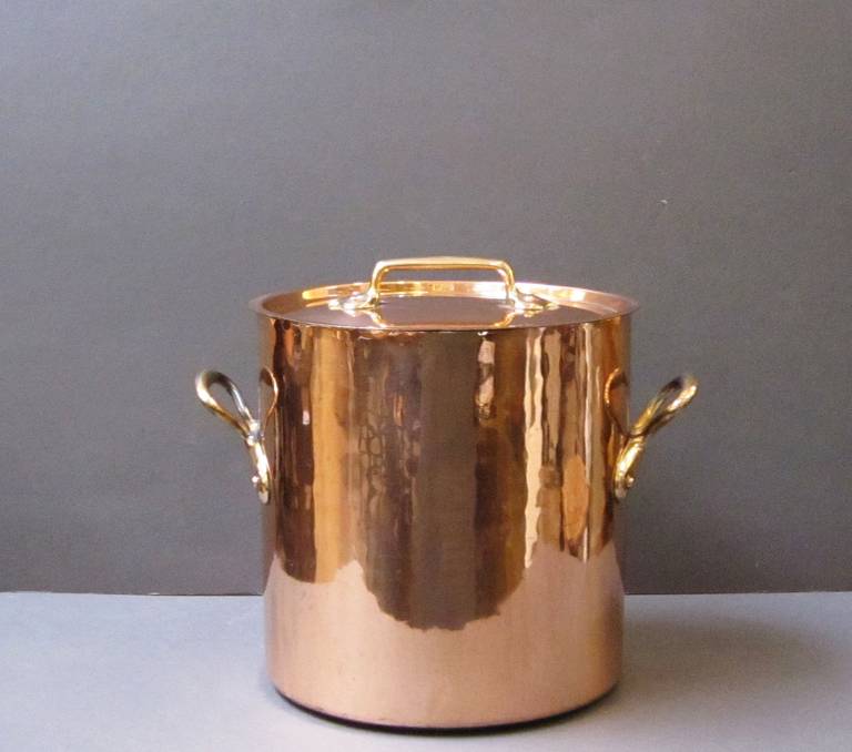 large copper pot with lid