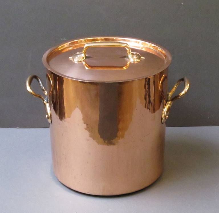 An English large cylindrical copper stock pot with two opposing handles, and fitted lid with handle - a lovely addition to the kitchen.