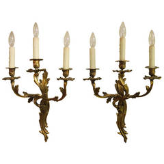 Pair of Régence Style Three-Arm Sconces of Gilt Bronze