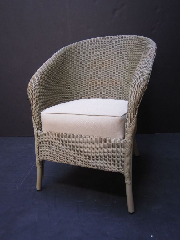 A Lloyd Loom chair, synonymous with classic English style.
Perfect for the Garden Room or Conservatory, this chair features the vintage look and comfort one only finds in the original, pre-War series. A flowing, arched back of woven wicker and wire