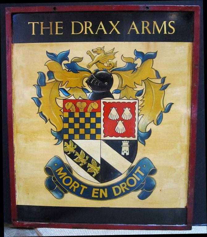 An authentic English pub sign (two-sided) featuring a painting of a coat-of-arms for the Drax or Drake family, entitled: The Drax Arms

With motto: Mort En Droit (French for Death In Law)

A very fine example of vintage advertising artwork,