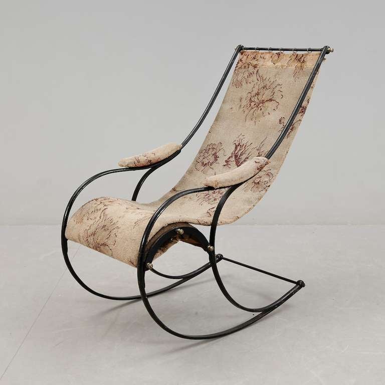 An English rocking chair made by Robert W Winfield during the last half of 19th Century. This type of rocking chair was showed for the first time in 1851 at the world exhibition. Cast iron frame with brass details.