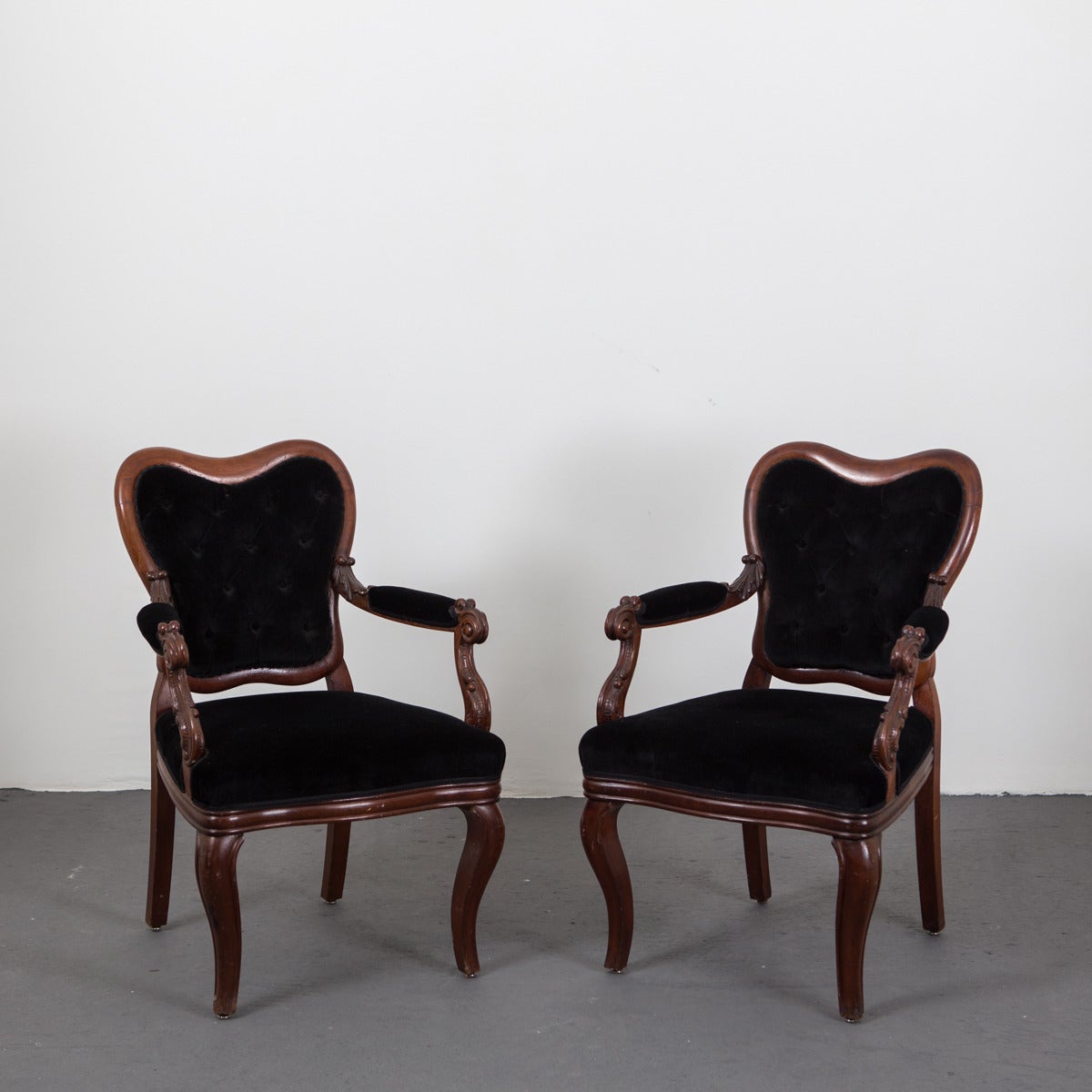 Pair of armchairs made during the late part of 19th century in the Rococo style.