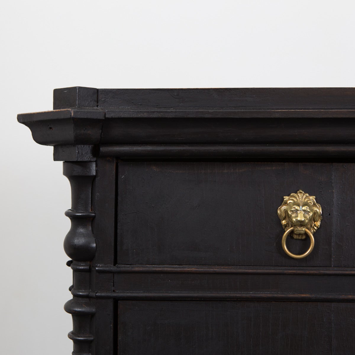 A black painted chest of drawers made during the Karl Johan period 1820-1850 in Sweden. Later paint job and hardware.