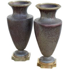 A Pair of French Urns with Brass Details