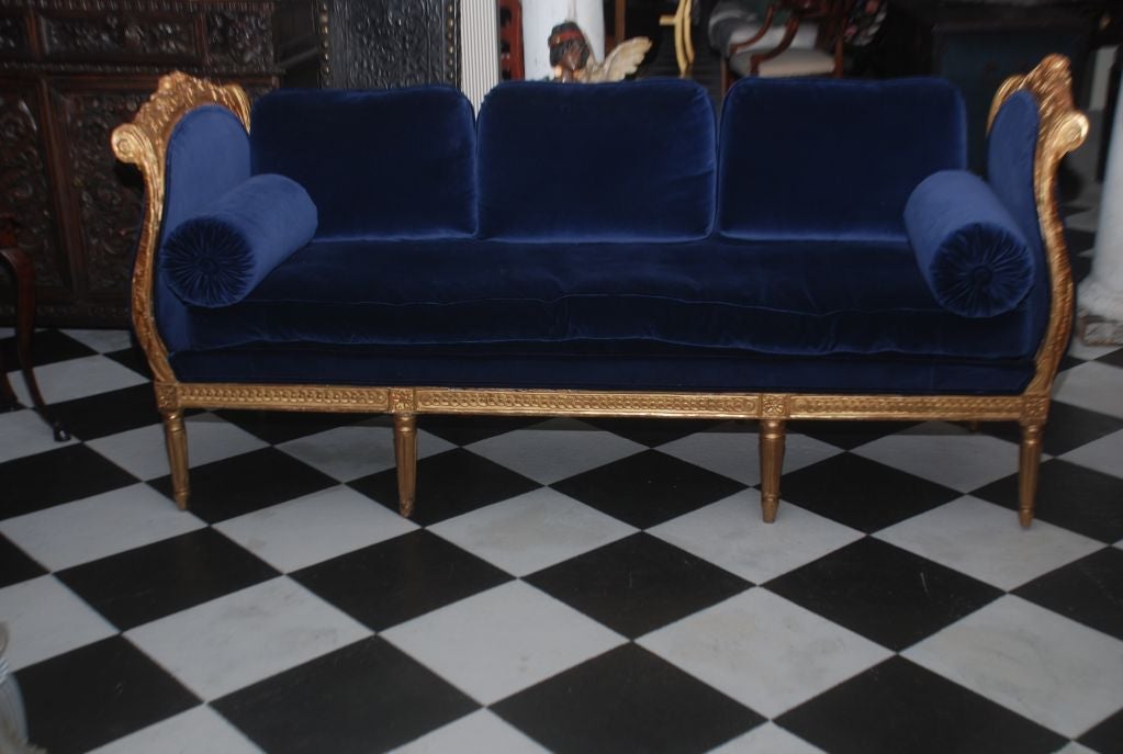 A Swedish High Gustavian Giltwood daybed. Sides with Rococo shape. Made for the Castles in Stockholm.