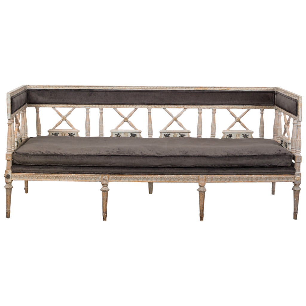 Sofa bench Swedish neoclassical original paint, early 19th century, Sweden.
A gorgeous sofa bench with a semi upholstered back. Made during the neoclassical period, 1790-1820. Frame in original faded greyish white paint and dark patinated details.