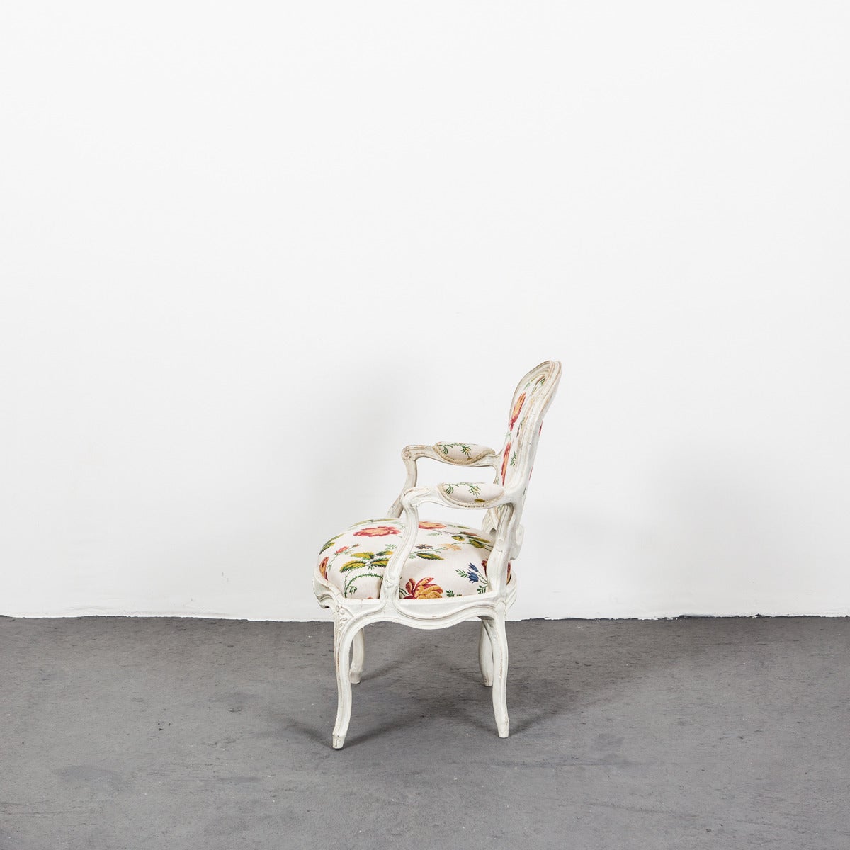 Armchair Swedish Rococo 18th Century Flowers Yellow Sweden. A Swedish Rococo armchair with cabriole legs and curved armrests and back.