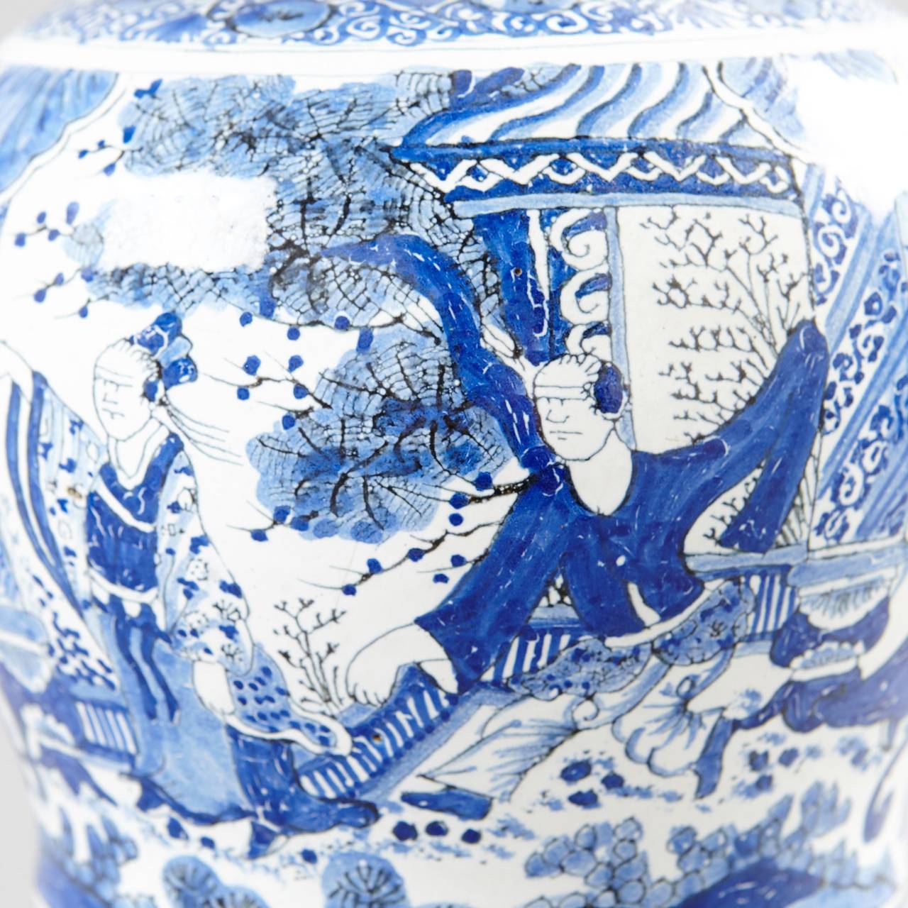 Glazed pottery with blue motifs.