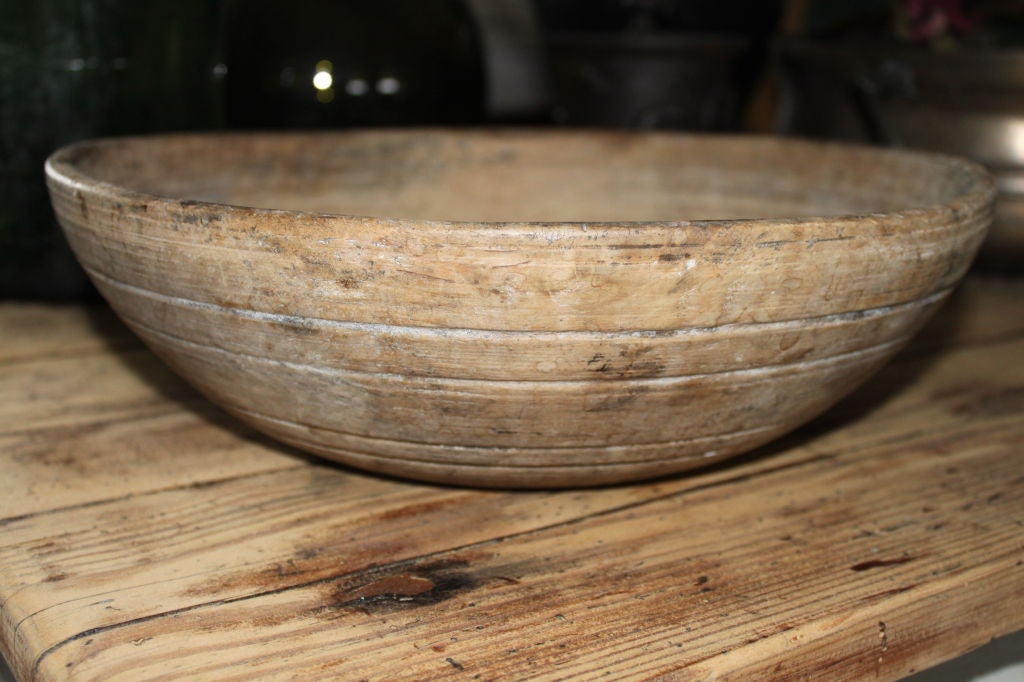 A beautiful Swedish wooden bowl with a soft patina.