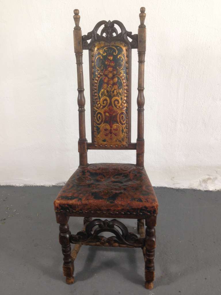 Side chiar made during the Baroque period in Sweden, ca 1700. Made in oak and upholstered in original gilt leather (somewhat later).