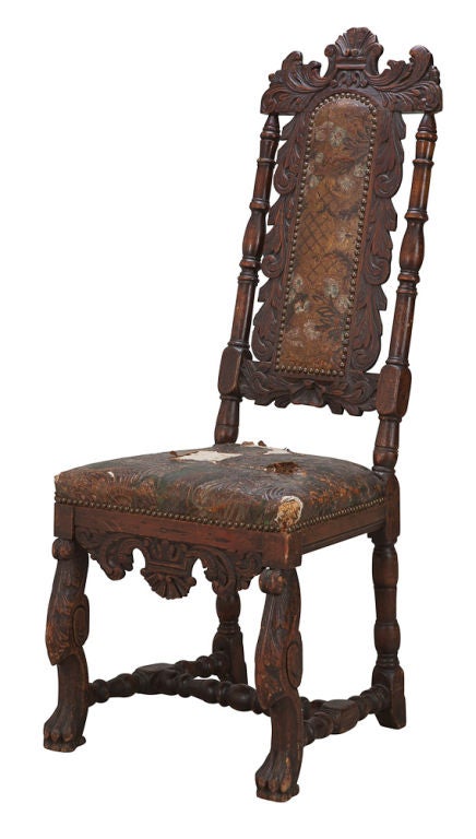 A pair of Baroque side chairs with their original leather