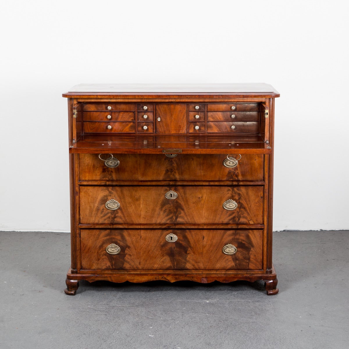 A chest top drawer extendable to a writing desk. Made in Sweden during the late Karl Johan period 1810-1830.