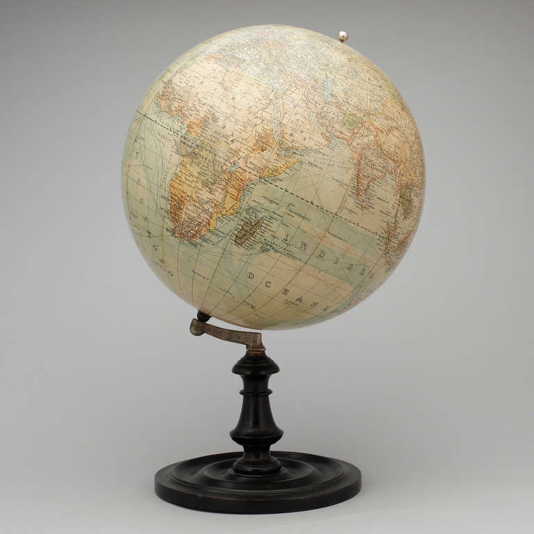 globe on wooden stand