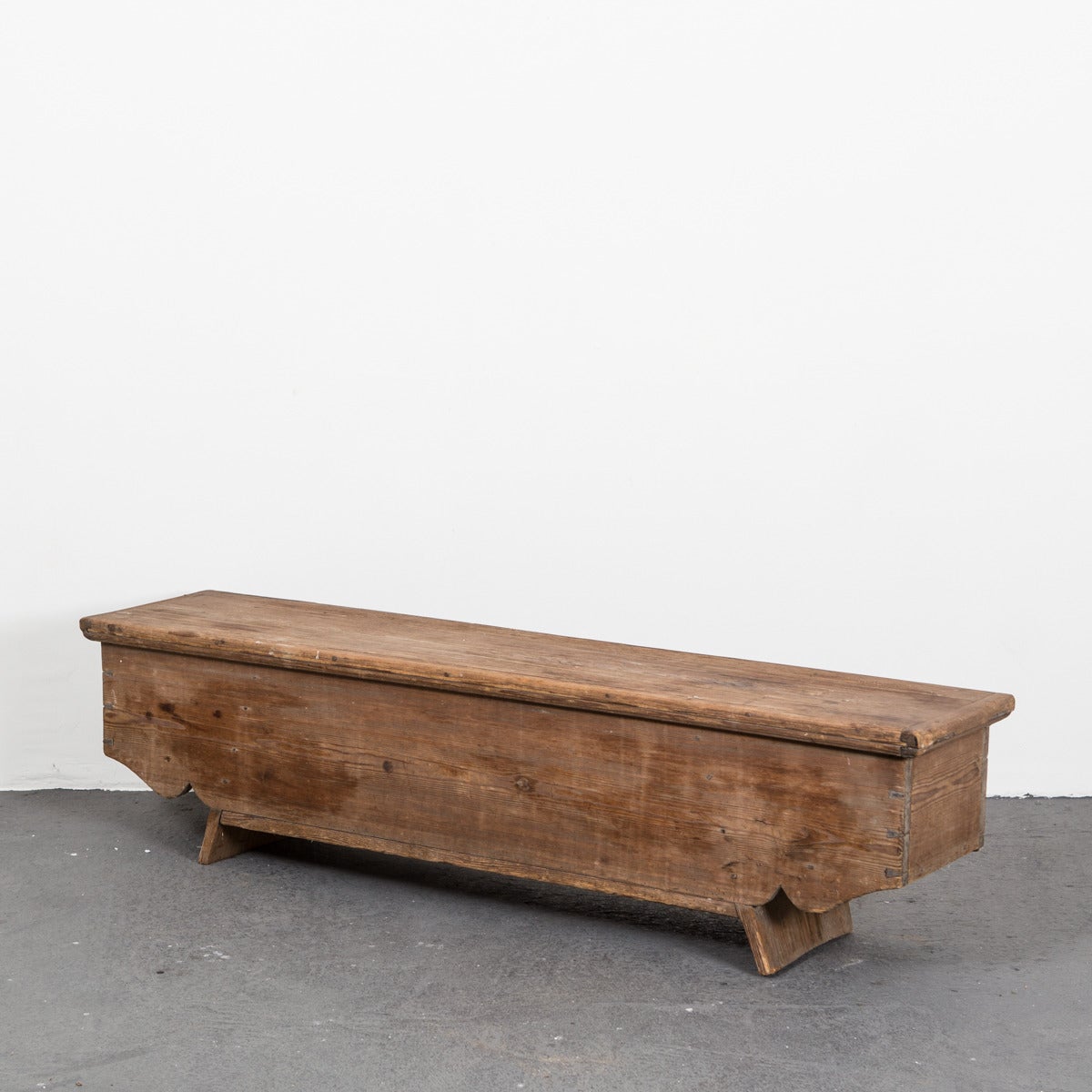 A storage bench made in Sweden during the 18th Century. All original paint and hardware. Interior with three storage spaces. Visible dove tail joints. Curved frieze. Gorgeous patina. Perfect as additional seating in a living room or as storage.