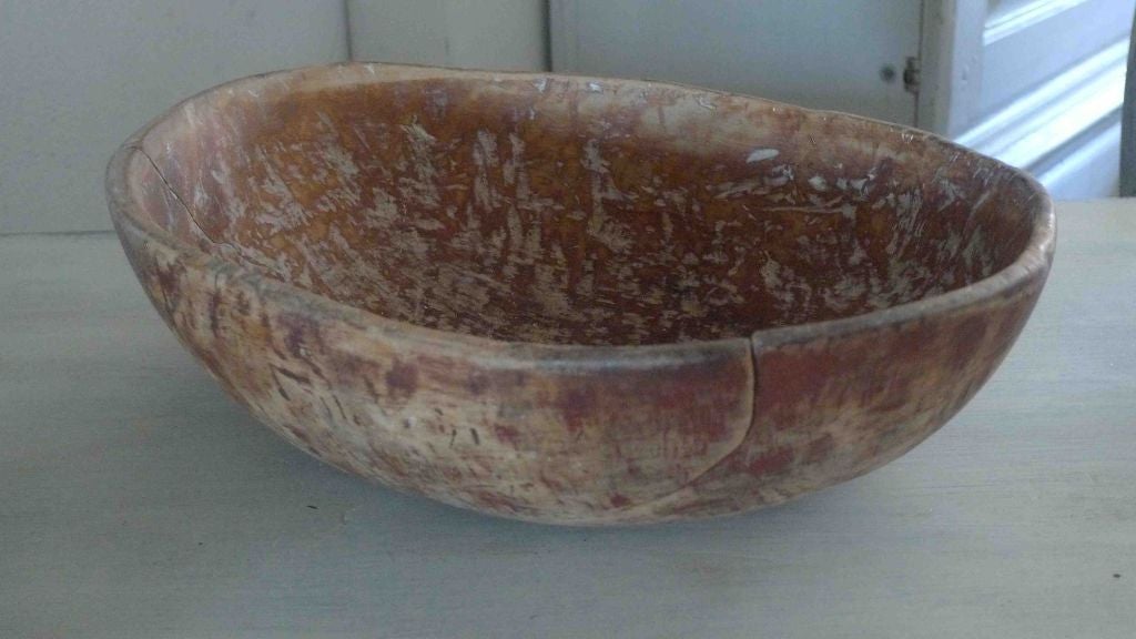 A Swedish wooden bowl made during the early 19th Century. Signed by the farmhouse it was used.