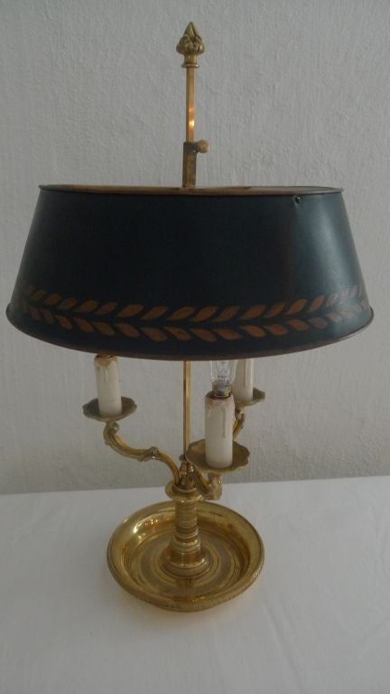 Lamp 19th Century Gilt bronze Metal Shade Neoclassical France . A French Bouillotte lamp made in gilt bronze and a painted metal shade. 3 electrified candle arms.