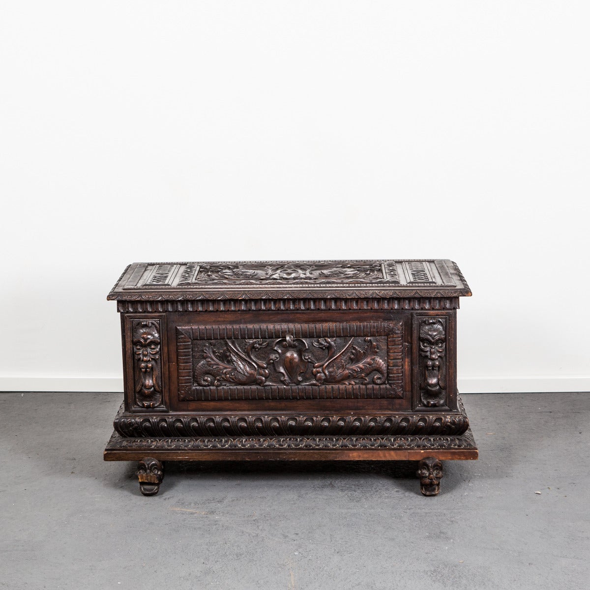 Chest Italian Renaissance period 17th century oak Italy. A stunning chest with exquisite carvings made in oak during the Renaissance period, most likely Italy. Feet in shape of dragons/dogs. Original hardware.