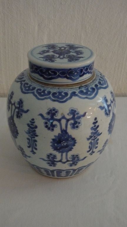 A beautiful blue and white bojan from the Kang shi period ,decorated with flowers and leafs,Rare because of the original top