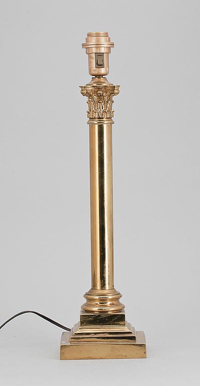 Brass lamp with neoclassical elements