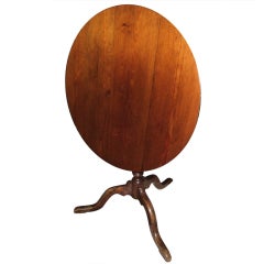 A Round Tilt Top Table in Mahogany
