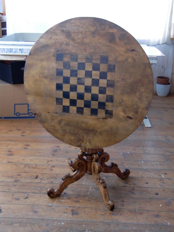 Table Tilt Top Swedish Chess Game Pedestal Sweden. A Swedish tilt top table made during the later part of 19th Century. Painted chess game on the top. Ornate base.