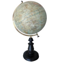Globe On Black Wooden Stand