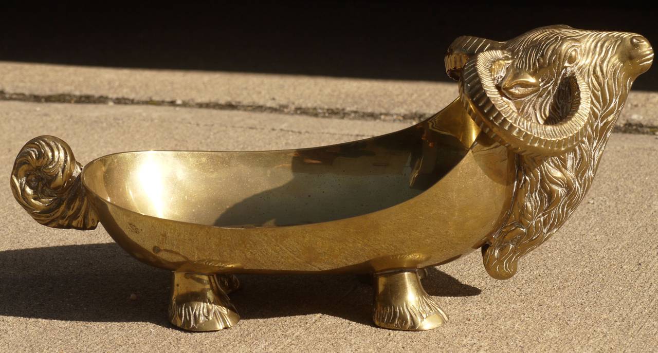 Stylish and quirky catch all brass bowl in the shape of an Ox made in the 1960s.