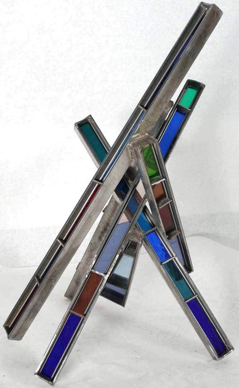 Love this table top sized sculpture constructed out of stained glass and welded steel.   