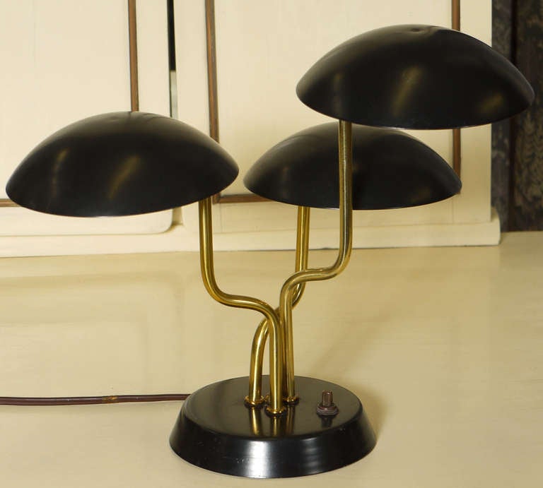 Very rare stylish table light designed by Gino Sarfatti for Lightolier early 1950s. Un-retouched. Some small scratches and minor lost of lacquer.

Published in: 1000 lights 1879 to 1959, Taschen. Pag. 461. 