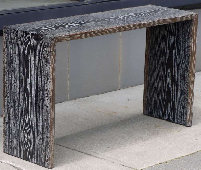 Cerused solid oak console table which could also be used as a sofa table depending on the sofa constructed with large dovetail joinery which connects the top with the sides...   The top and sides are the same board.  Each leg has 2 countersunk