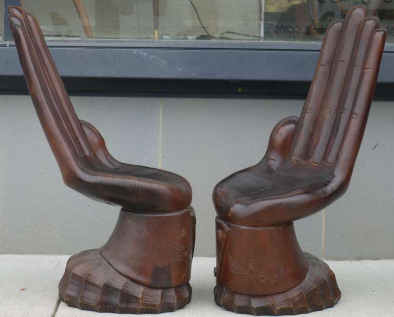 Wonderful quirky diminutive pair of hand chairs made in Indonesia in the 1960s.  Just great as sculptural objects to add a touch of whimsy.