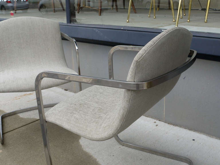 Stunning svelte chair by Pace International constructed using seamless chrome tubing.  All attachment points are hidden behind upholstery and are very airy and luxurious.  Newly upholstered in this ribbed schumacher fabric that feels like an old