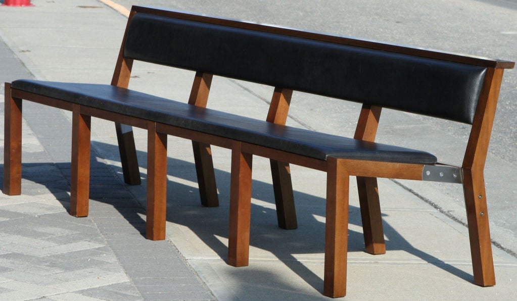 Prototype bench designed by Jean-Michel Wilmotte and produced by Tecno.  Beatifully consructed mahogany framework which supports a single length cushions in full grain black leather.