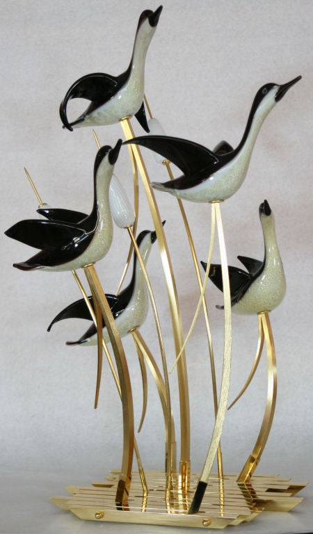 Large cased murano glass with silver intrusions centerpiece sculpture on a 23k gold plated base by Toso.