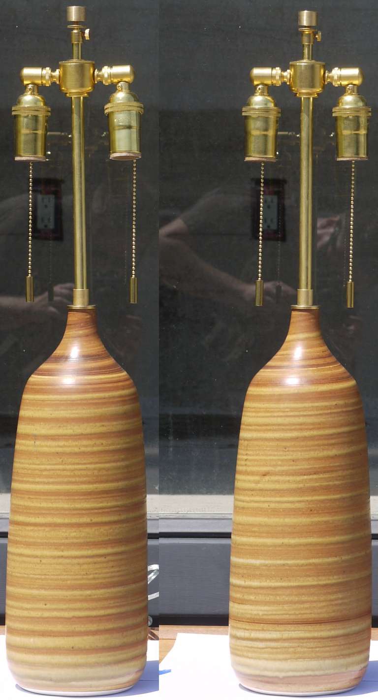 Wonderful pair of ceramic lamps in a great chocolatey butterscotch glaze by Lotte and Gunnar Bostlund.