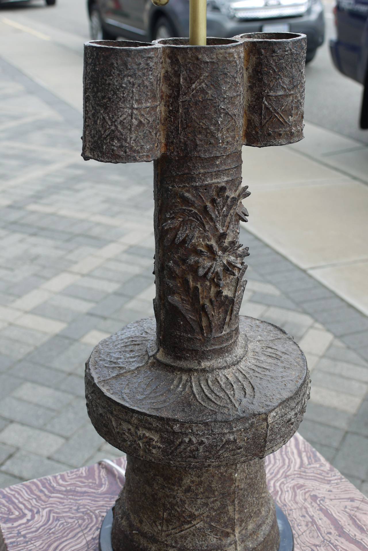 Sophisticated cast iron lamp made from a Ming Dynasty arrow vase. Arrow vases were originally made as part of a game where players tried to shoot arrows through the loops. A similar vase is in the British Museum(museum number 1982, 0213.1) lamp was