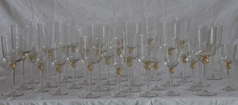 A complete stemware service for ten without a single chip.  Featuring red wine, white wine and aperitif glasses.  The set is monogramed in glass on the foot with an O in script.
