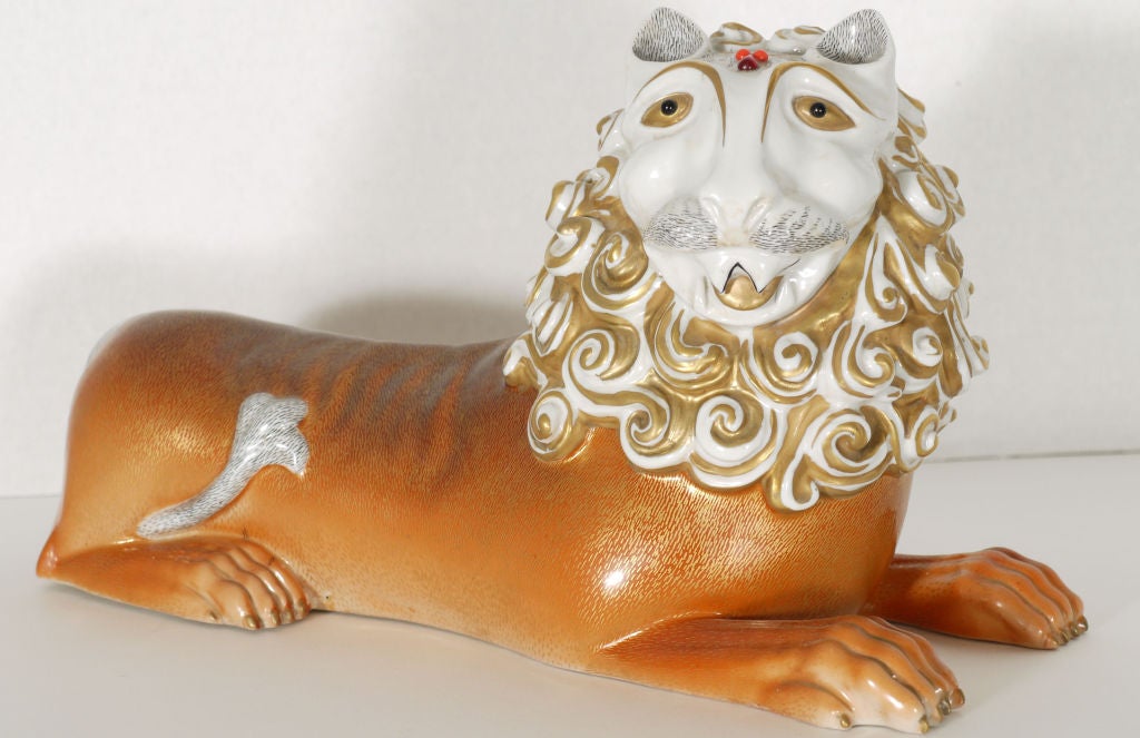 Stunning super stylish recumbent lion done in a similar style to a bird featured in the book 
