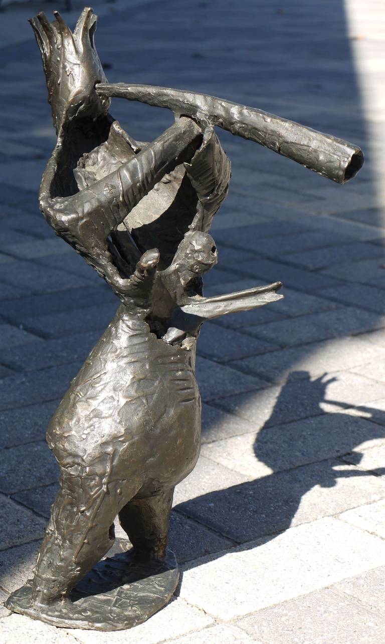 Whimsical large allegorical bronze of a crowned horn player with a wonderful stance, circa 1960.