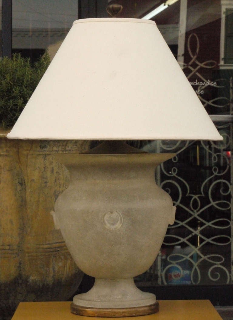 Classically shaped scavo glass lamp by Seguso for Sarreid circa 1983.  Featuring an aged gilt wood base and cast bronze finial.  Scavo goes through a process which makes it look like ancient roman glass.  Shade is original and has some slight wear. 