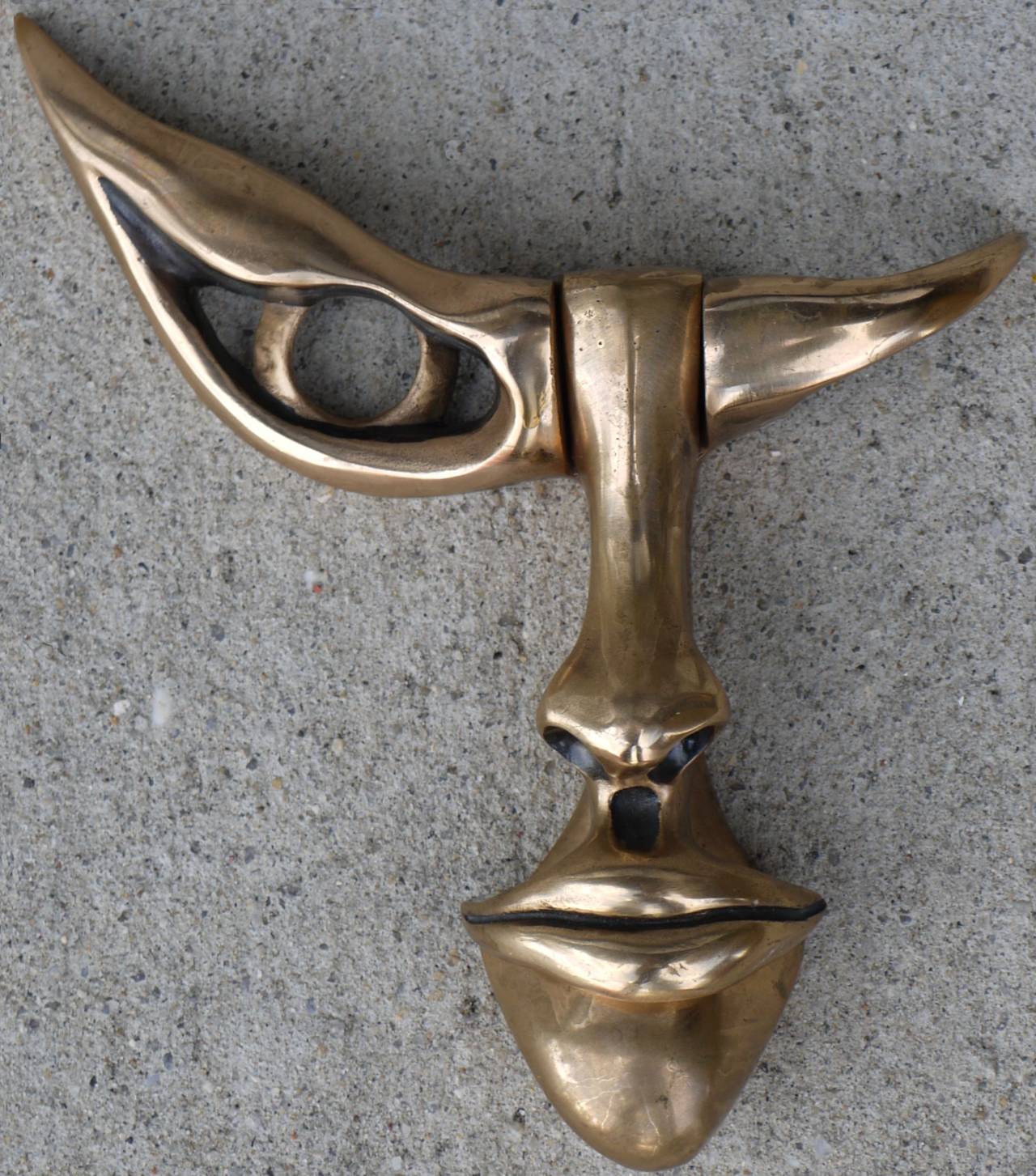 Absolutely stunning bronze door knocker signed, numbered and dated under part that lifts.