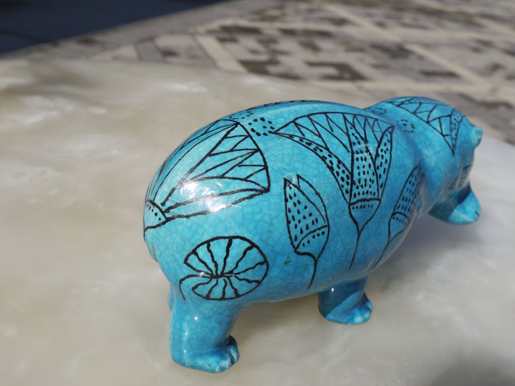 Stunning turquoise blue crackle faience glaze with a egyptian style motif. Signed with the Z with a squiggle through it and then below it's marked Italy.