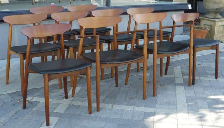 Large set of 10 sculpted teak dining chais designed by Harry Ostergaard for the danish company Randers Møbelfabrik.