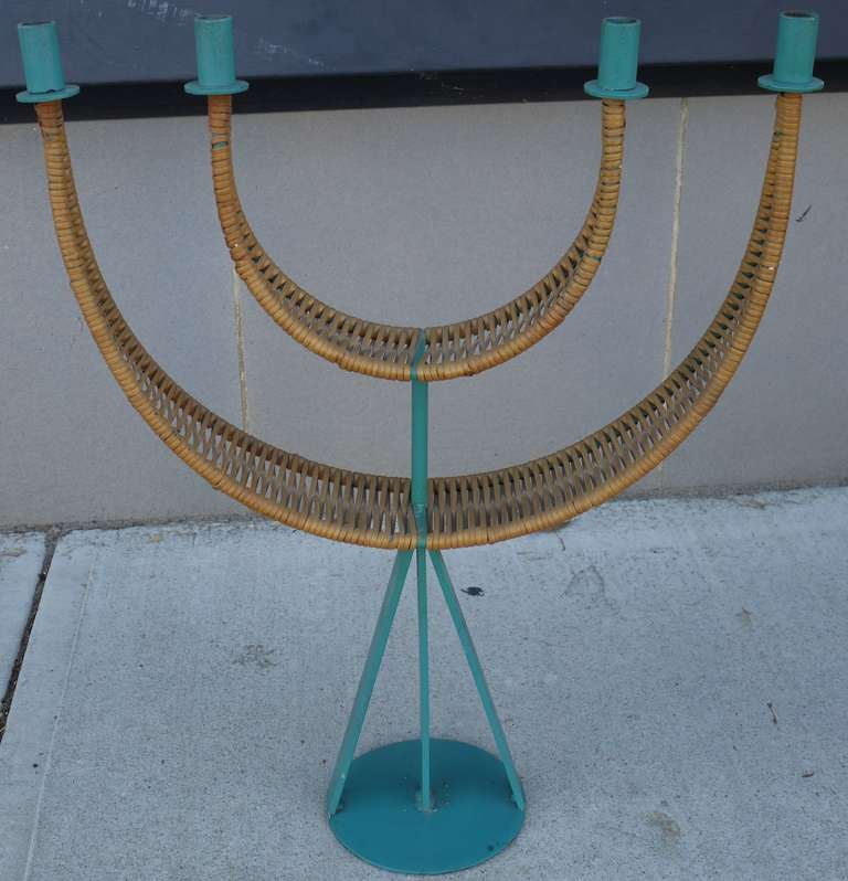 Large sculptural candelabrum in original enamel teal and cane by Arthur Umanoff.   Teal is original to piece and is rarer than the black.  Also have the same candelabra available with black enamel.