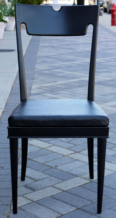 Stunning modernist set of chairs by Paolo Buffa in black lacquer and full grain black leather.