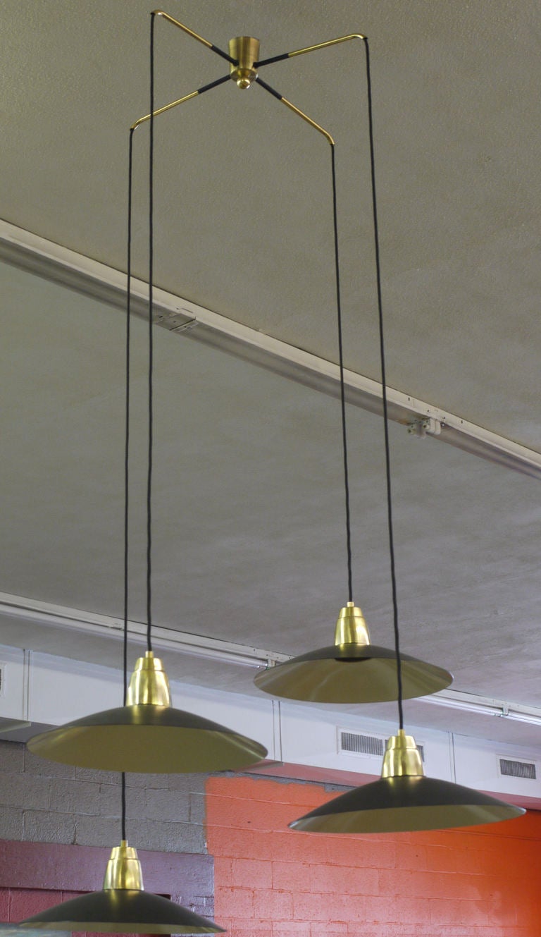 Stunning Italian 4 light enamel and brass hanging fixture restored to like new condition.  The length and configfuration can be changed by shortening the cord.  