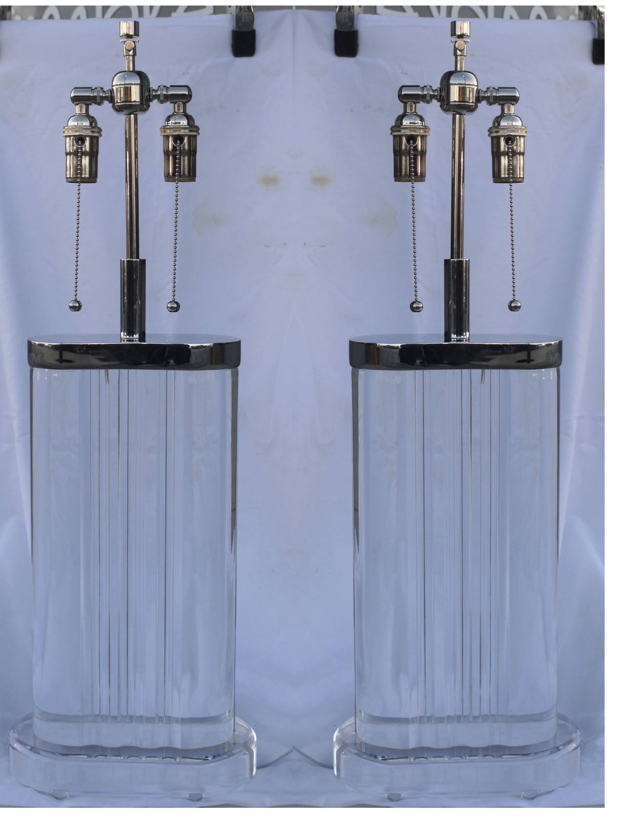 Chunky pair of optical Karl Springer style lamps with polished nickel hardware.